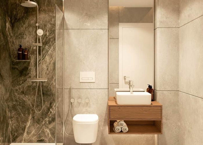 Phòng tắm với thiết kế nhỏ gọn khi sử dụng ánh đèn vàng tạo độ sáng dịu nhẹ
