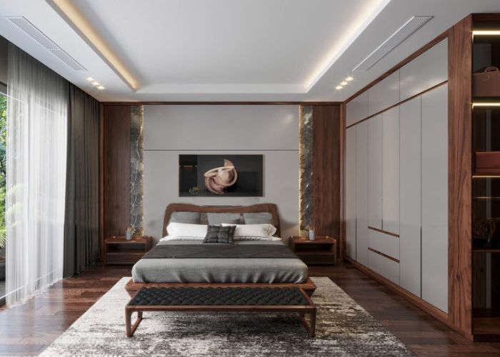 Phòng ngủ 30m2 được thiết kế với màu gỗ chủ đạo