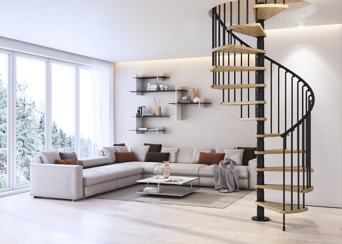 Thiết kế cầu thang dạng xoắn ốc đặt giữa phòng khách mang lại sự khác biệt trong cách thiết kế nhà của gia chủ