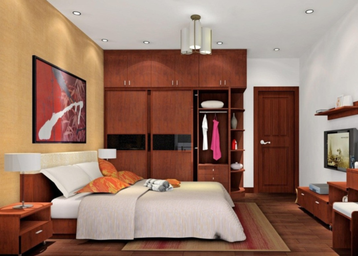 Nội thất bằng gỗ lim có màu sắc nâu đỏ đậm tạo sự ấm cúng, cổ kính cho căn phòng.