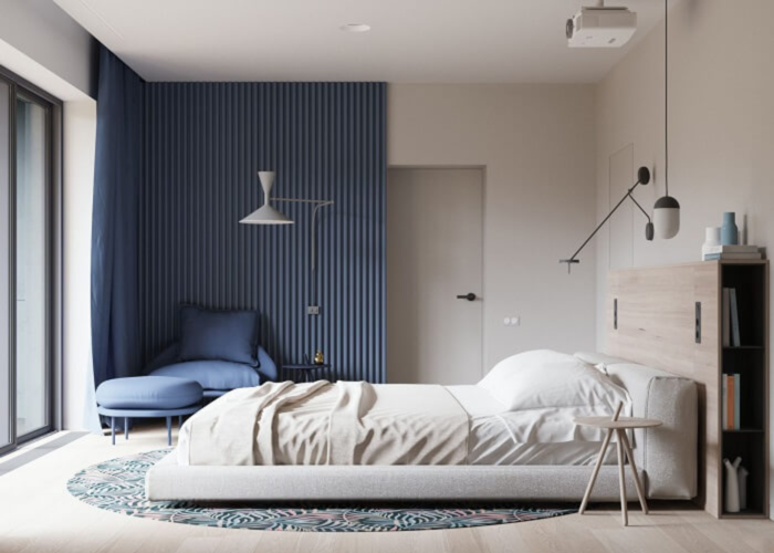 Mẫu phòng ngủ với góc tường và bộ bàn ghế màu xanh navy được trang trí đơn giản nhưng vẫn tạo điểm nhấn nổi bật