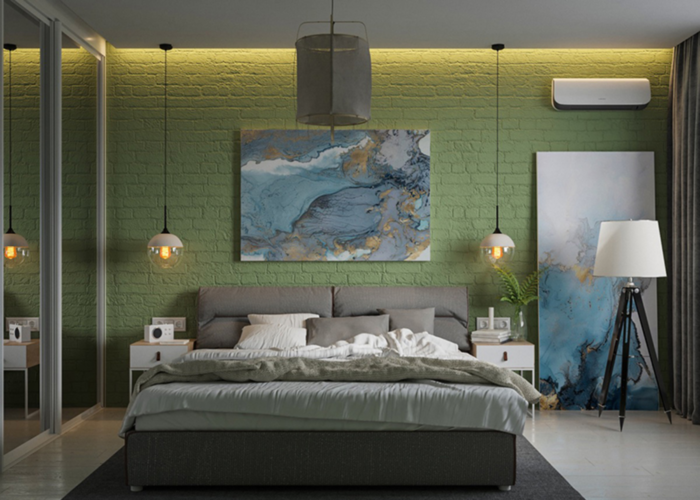 Bức tranh treo tường, 2 chiếc đèn đơn điệu và một chậu cây xanh giúp căn phòng trở nên sang trọng hơn