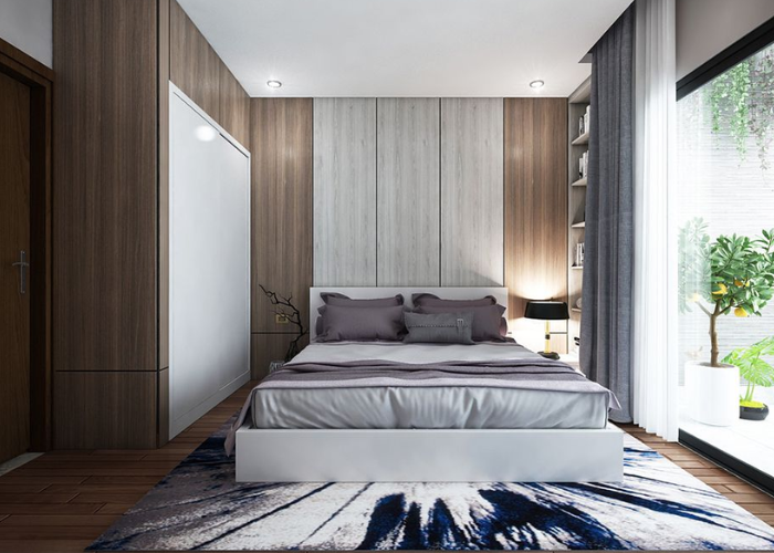 Phòng ngủ căn hộ chung cư được thiết kế theo phong cách hiện đại với gam màu trắng và xám