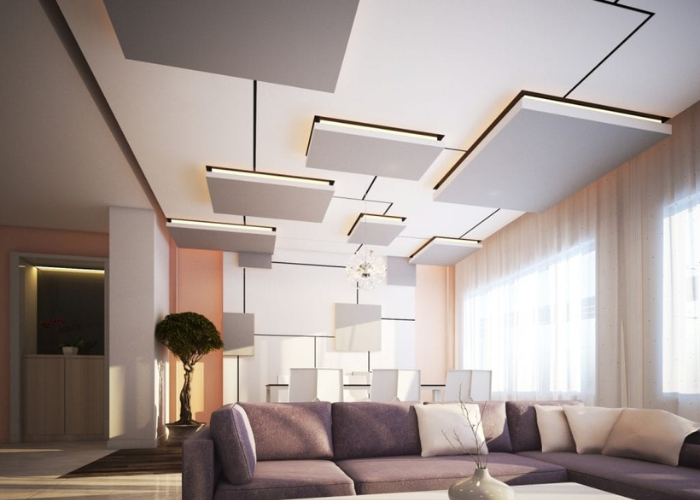 Trần thạch cao thiết kế hình khối nổi và đèn âm trần tạo sự mới lạ cho phòng khách