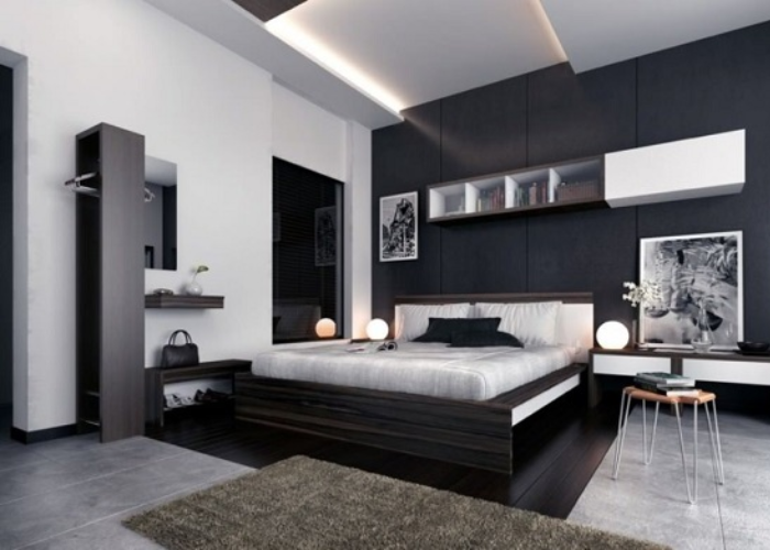 Những bức tường đen trắng xen kẽ kết hợp cùng với sàn gỗ là một ý tưởng thiết kế tuyệt vời cho phòng ngủ nam