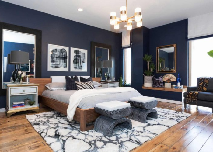 Phòng ngủ nam được trang trí bằng thảm trải sàn giả đá cùng đồ nội thất với nhiều kiểu dáng lạ 
